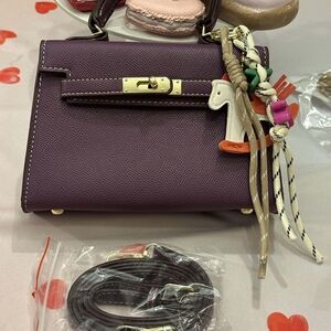 Chic Purple Mini Bag with Gold Accents